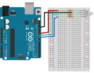 Layout of a breadboard for mixing RGB LED colors using Arduino